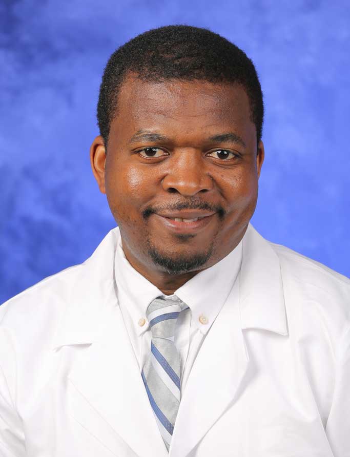 A professional head-and-shoulders photo of Dr. Alain Lekoubou