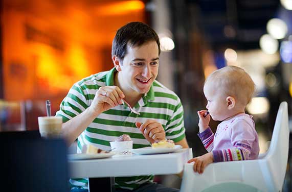 Family eating at the Tree House Café at Penn State Health  Children's Hospital.