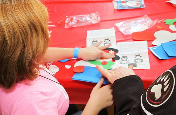 A child enjoying the performance area at Penn State Health Children's Hospital.