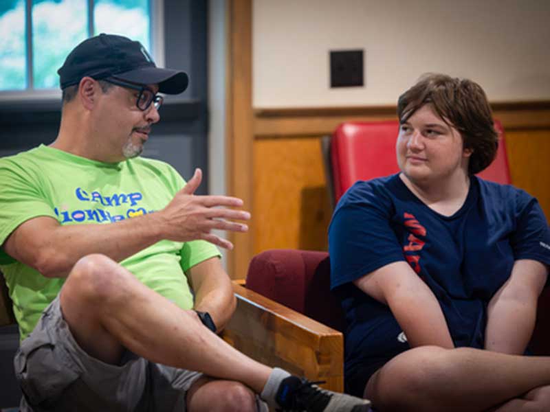 Don Shanebrook, an adult congenital heart patient, shares his experiences with Olly Murphy, a Camp Lionheart participant.