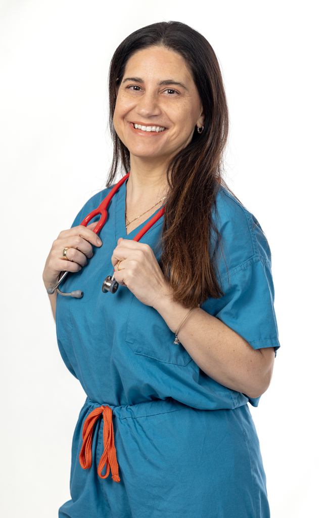 Photo of a woman with a stethoscope around her neck.