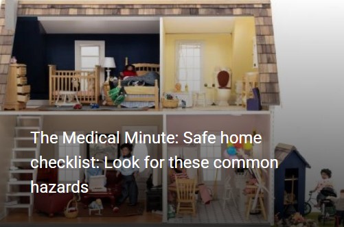 A dollhouse shows examples of home safety hazards.