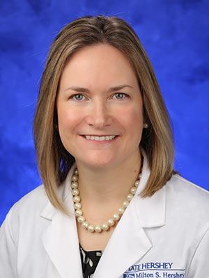 April Armstrong, MD pictured in a professional head and shoulders photo