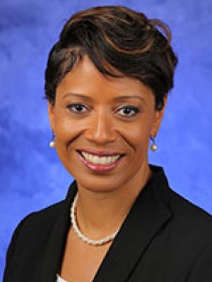 Jeanette Gibbs, pictured in a professional head and shoulders photo