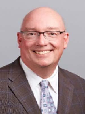John Dugan, professional head and shoulders photograph.
