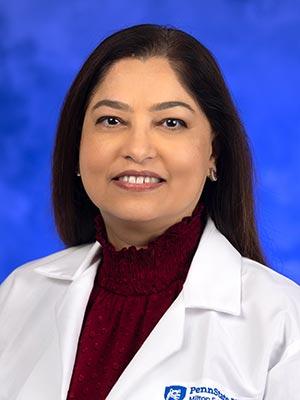 Munima Nasir, MD, in a professional head and shoulders photograph.