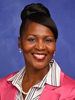 Leslyn Williamson is pictured in a professional head and shoulders photo.