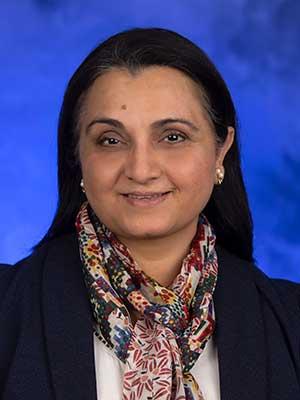 Mumtaz Darbar, in a professional head and shoulders photograph.