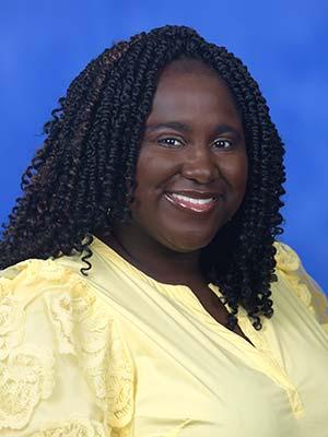 Makeba Cameron, professional head and shoulders photograph.