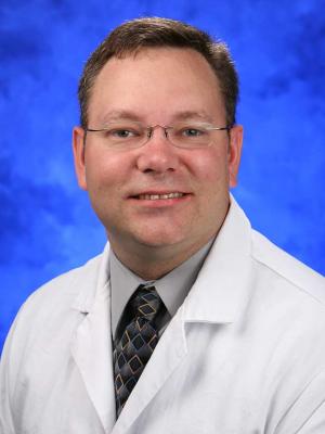 E. Scott S. Halstead, MD,  PhD