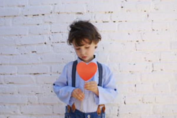 Image of Boy Holding Heart-shape Paper on Stick