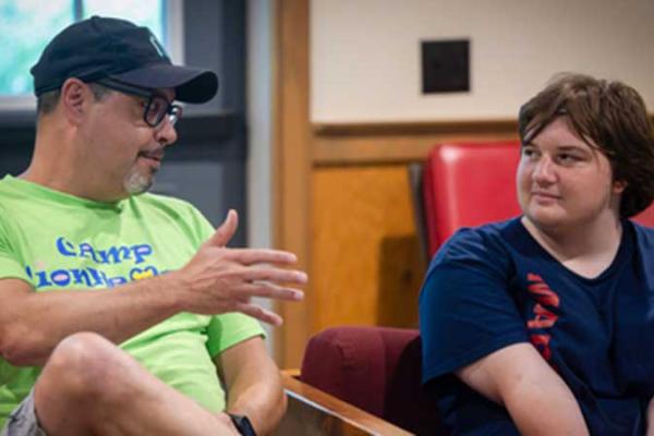 Don Shanebrook, an adult congenital heart patient, shares his experiences with Olly Murphy, a Camp Lionheart participant.