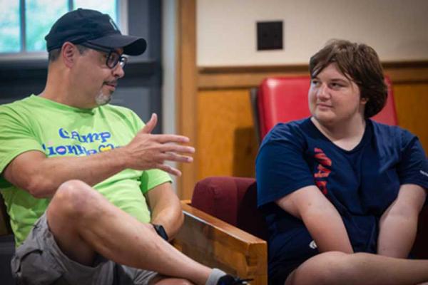 Don Shanebrook, an adult congenital heart patient, shares his experiences with Olly Murphy, a Camp Lionheart participant.