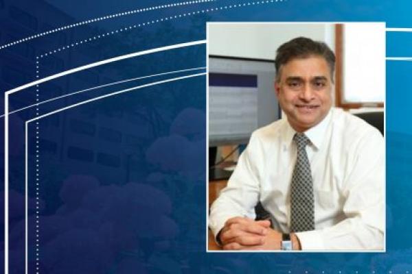 A professional headshot of Dawood Darber, MD, is superimposed on a blue background