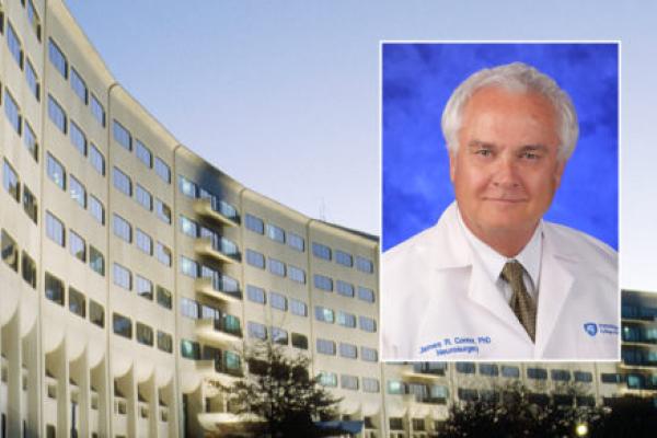 A head and shoulders professional portrait of James Connor against a background image of Penn State College of Medicine.