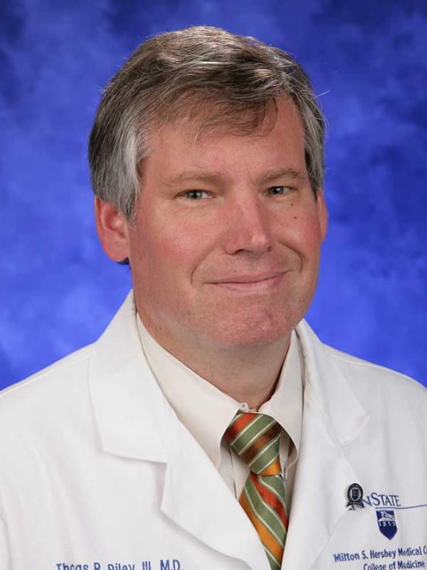 A head-and-shoulders photo of Thomas R. Riley III, MD