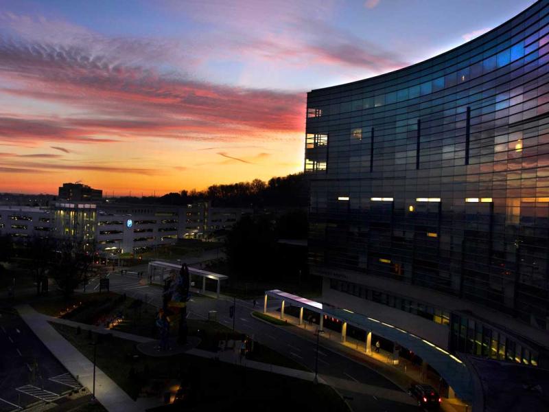 Sunrise over Penn State Health Children's Hospital exterior building.